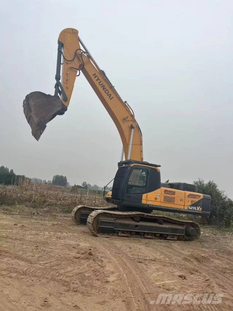 Hyundai Robex 520 VS حفارات زحافة