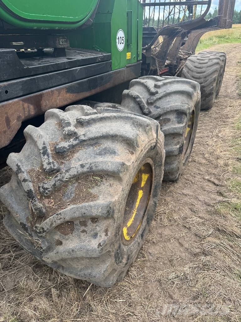John Deere 810 E Kihordók