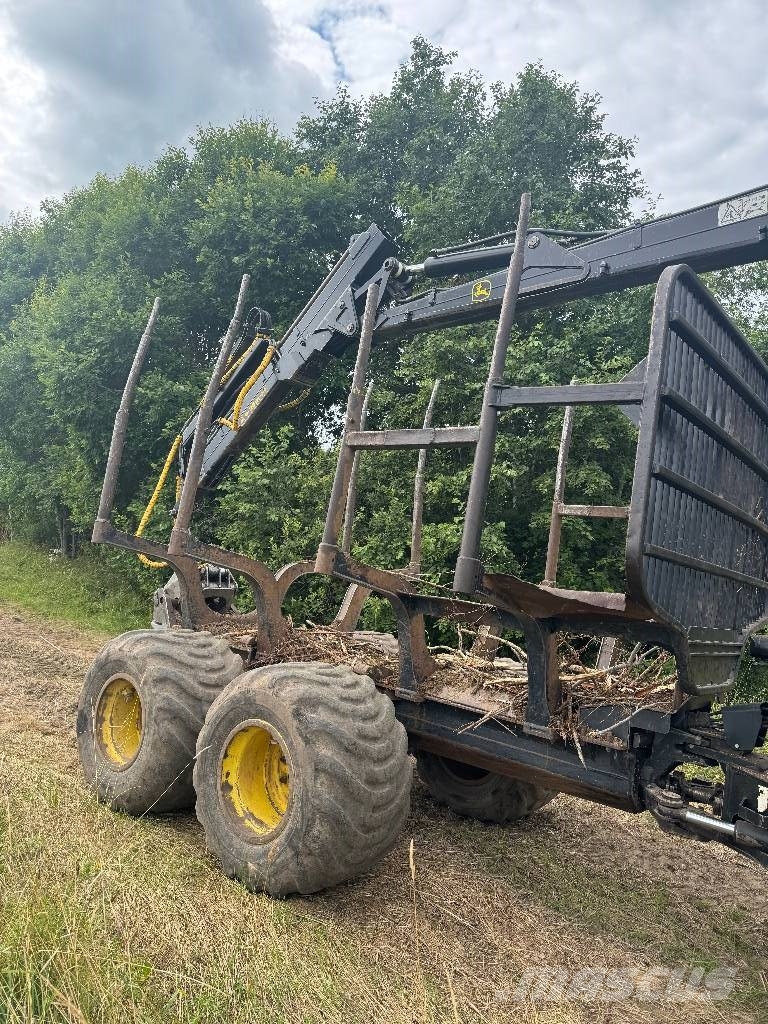 John Deere 810 E Kihordók
