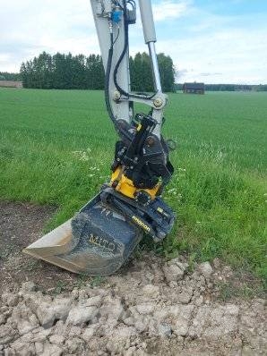 Takeuchi TB395W حفارات بعجل