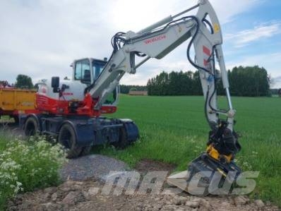 Takeuchi TB395W حفارات بعجل