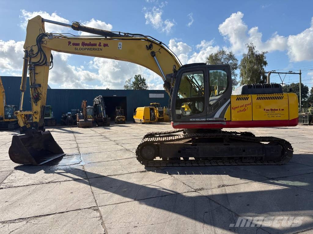 New Holland Kobelco E 265 C - Dutch machine Rupsgraafmachines