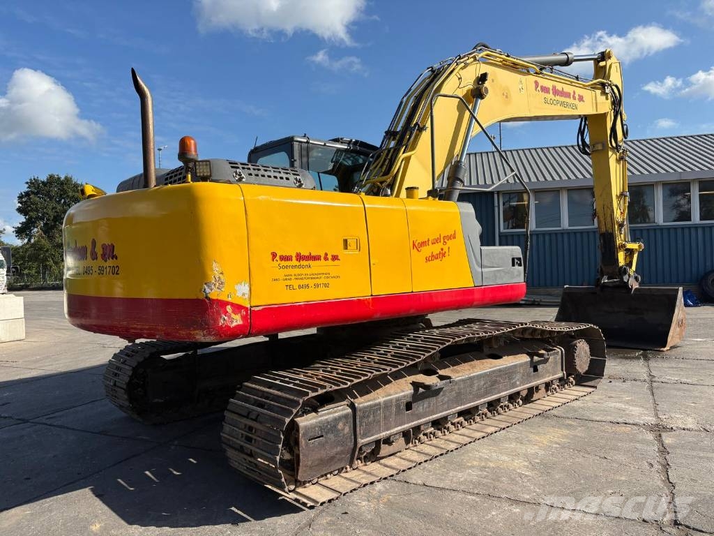 New Holland Kobelco E 265 C - Dutch machine Rupsgraafmachines