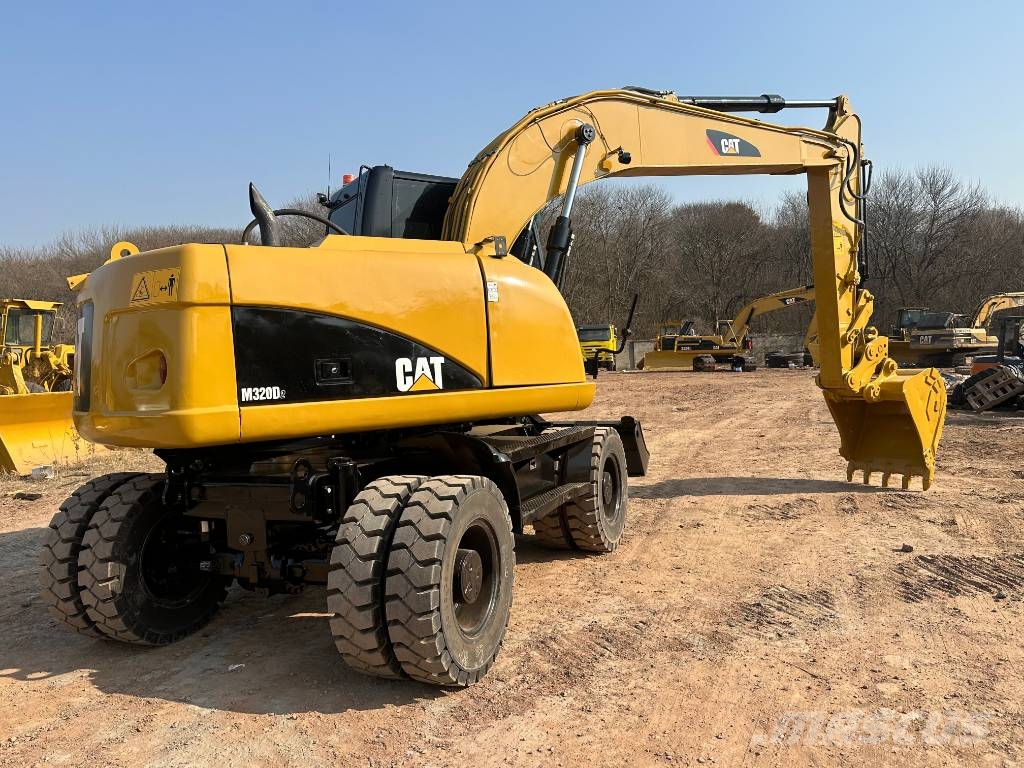 CAT M320D used cat wheel excavator Pelle sur pneus