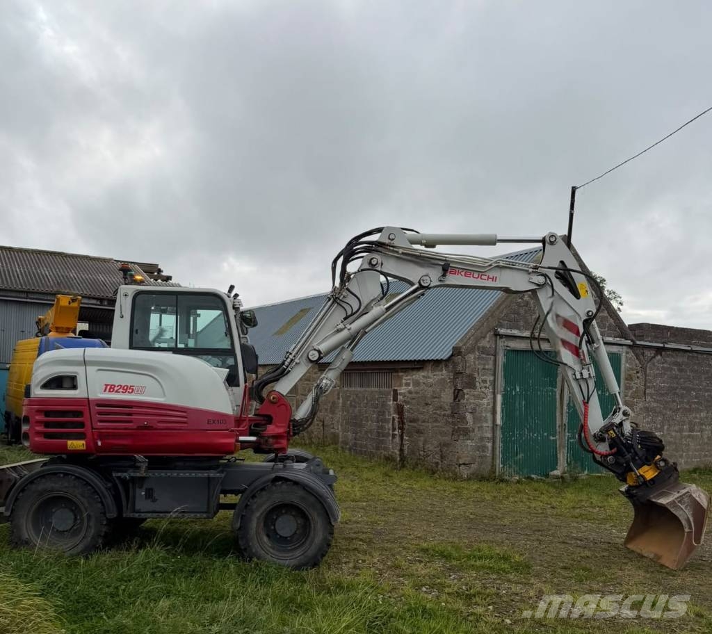 Takeuchi TB 295 W Engcon حفارات بعجل