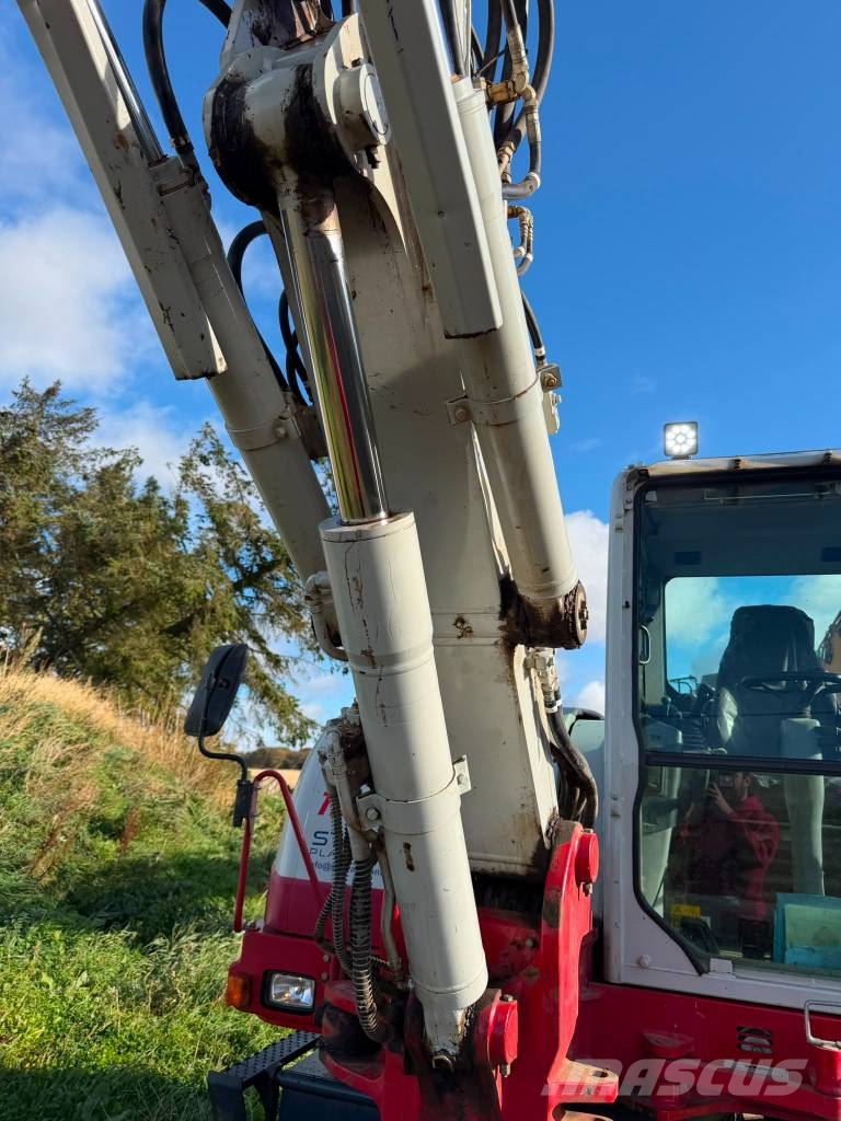 Takeuchi TB 295 W Engcon حفارات بعجل