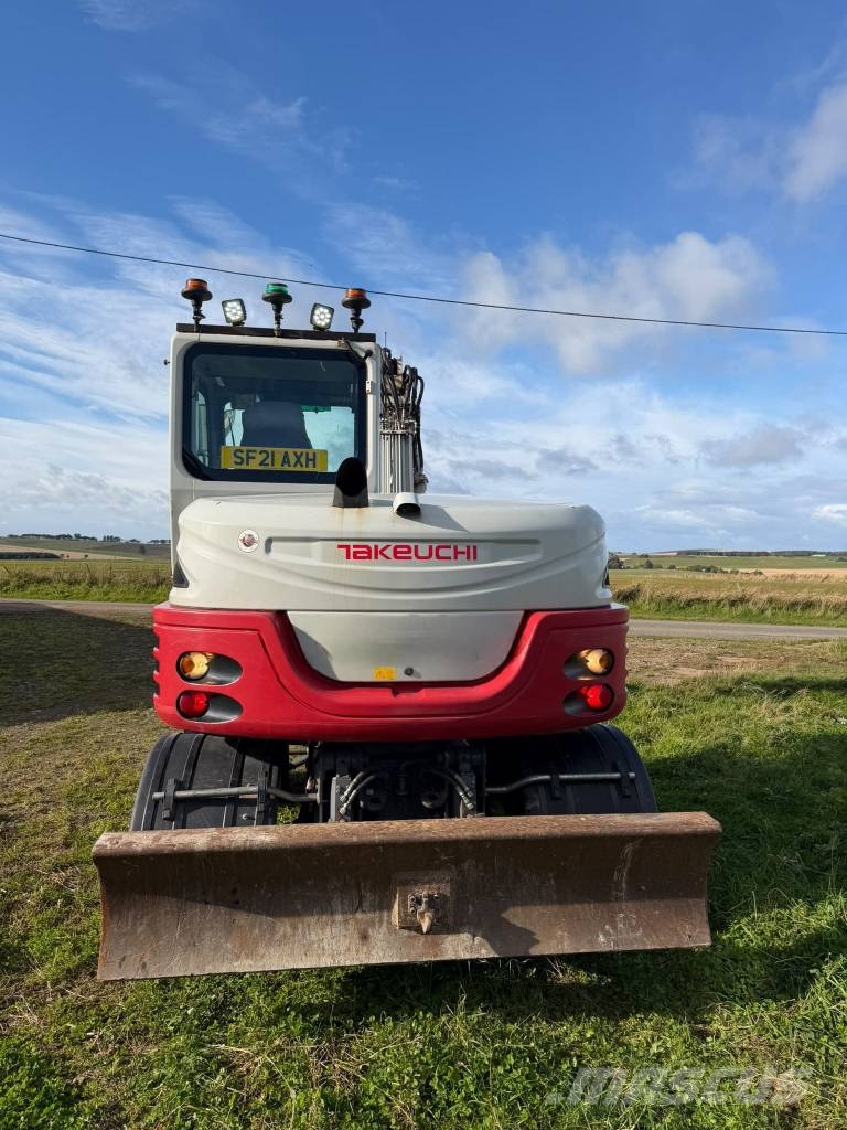 Takeuchi TB 295 W Engcon حفارات بعجل