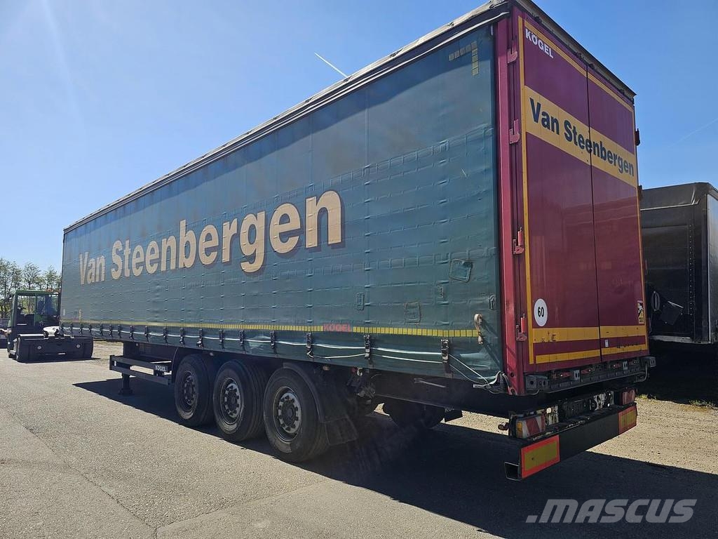 Kögel SN 24 - SLIDING ROOF - COIL - MERCEDES DISC TUV 02 Semirremolques de caja de lona