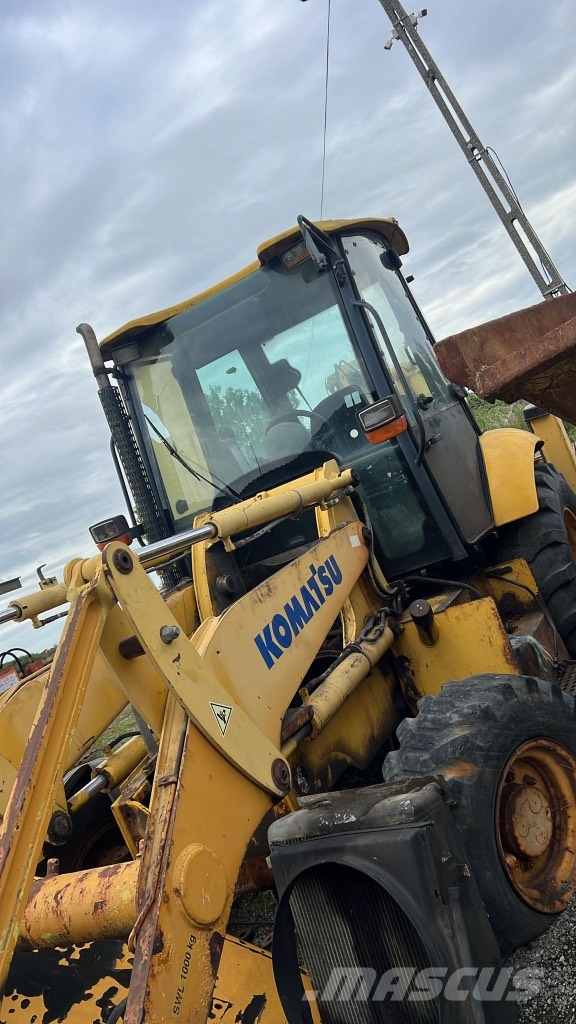 Komatsu WB 93 R Ejes