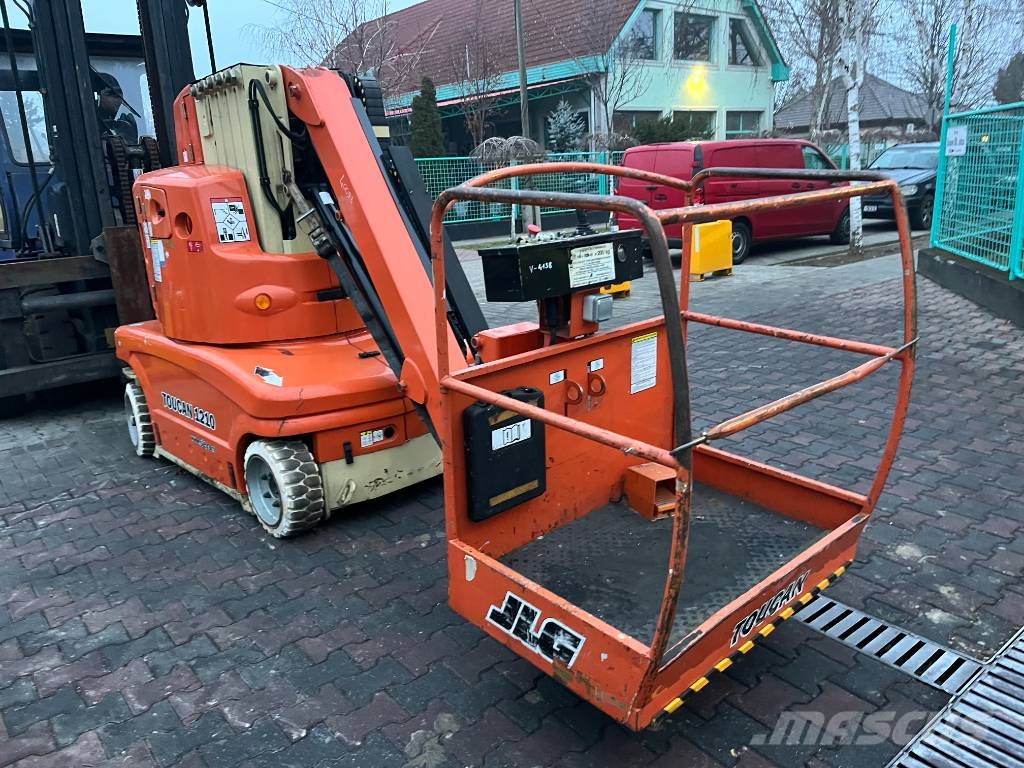 JLG TOUCAN 1210 V-4138 FOR EXPORT ONLY EO Вертикальні щоглові підйомники