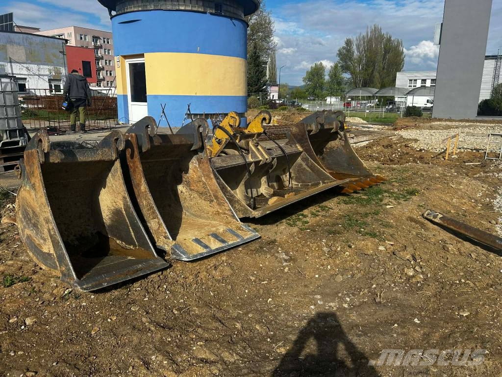CAT 313 D Ekskavatori uz riteņiem