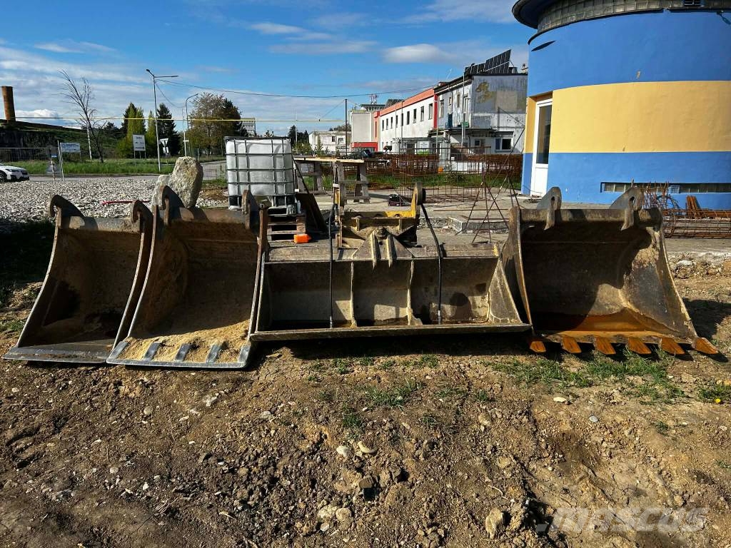 CAT 313 D Ekskavatori uz riteņiem