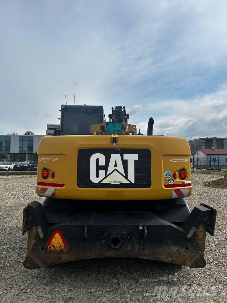 CAT 313 D Ekskavatori uz riteņiem