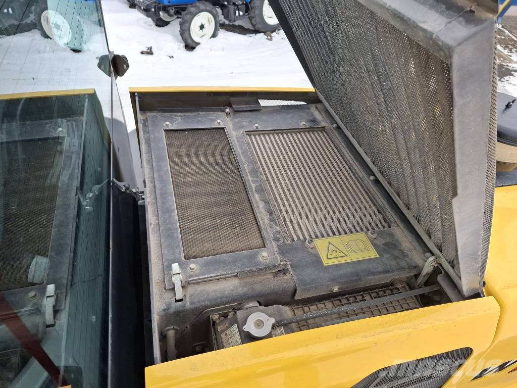 New Holland W190 D Knik- en schrankladers