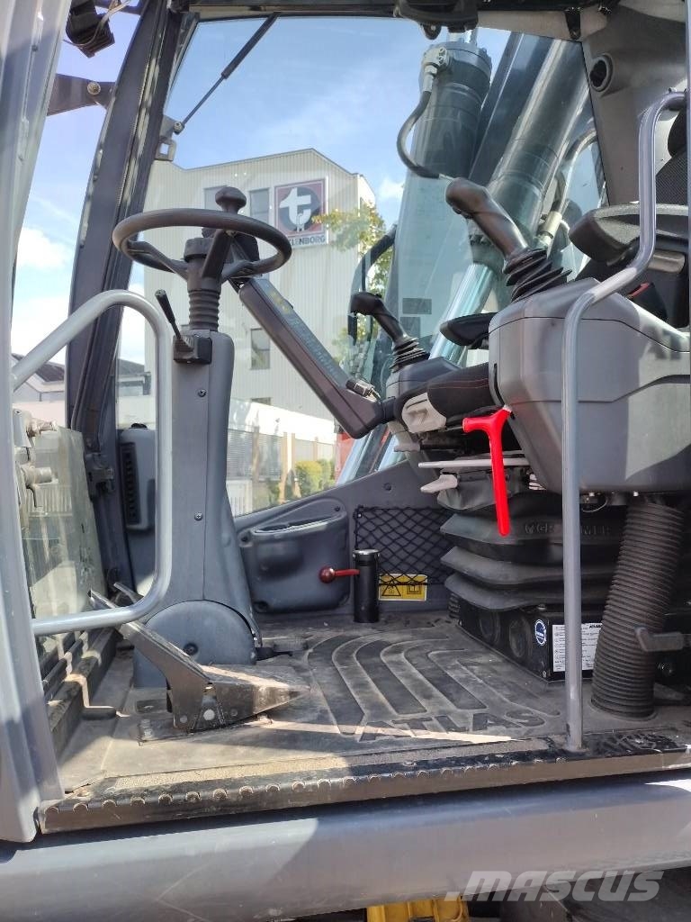 Atlas 190W mit OilQuick OQ70-55 Mobilbagger