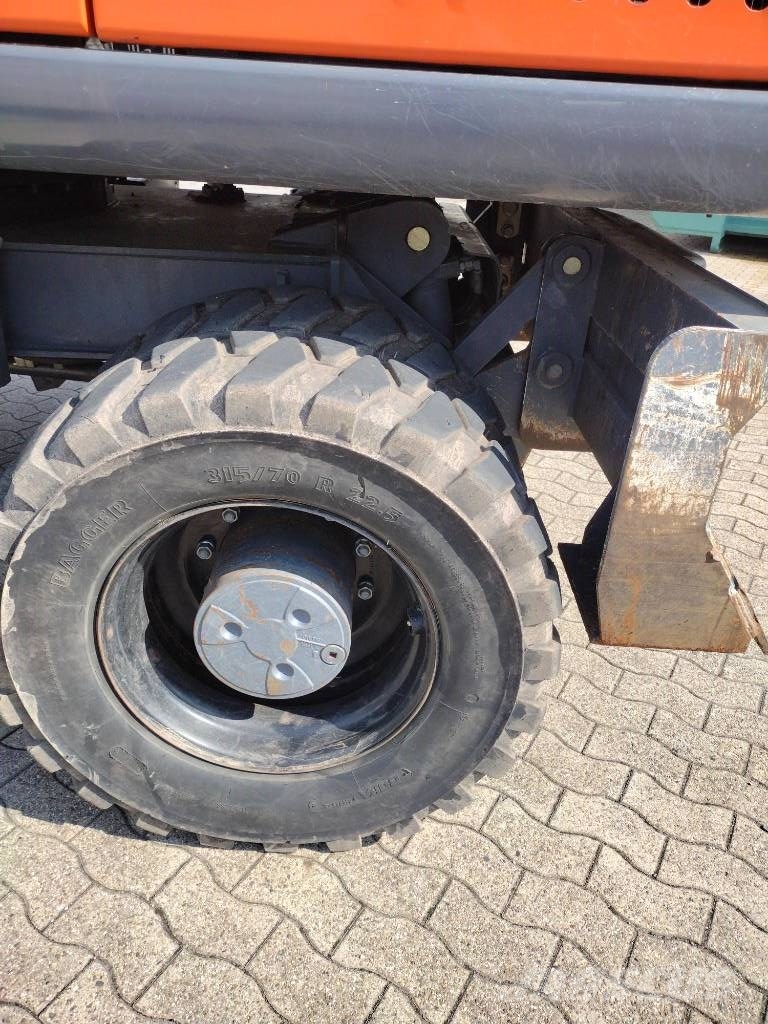 Atlas 190W mit OilQuick OQ70-55 Mobilbagger