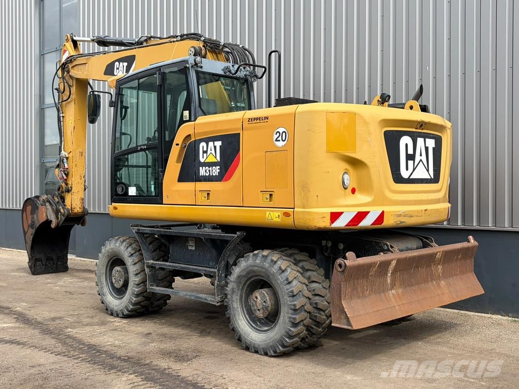 CAT M318F Bageri na kotačima