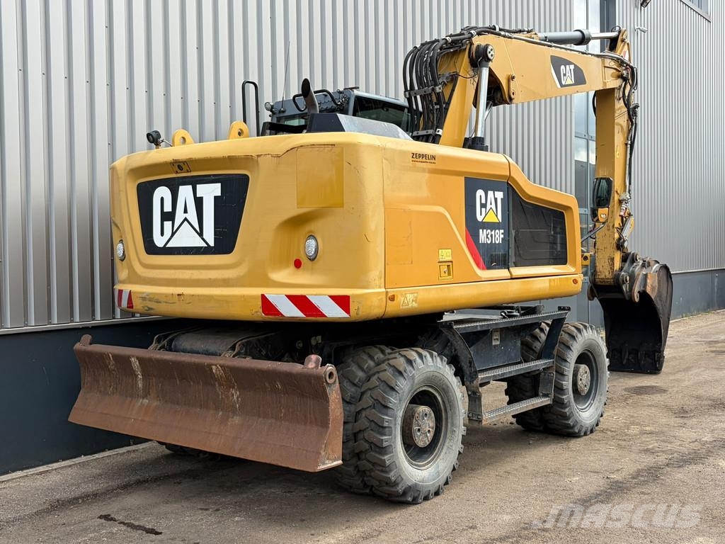 CAT M318F Bageri na kotačima