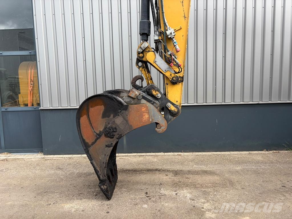 CAT M318F Bageri na kotačima