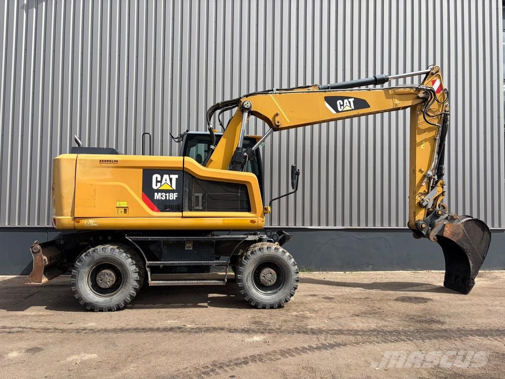 CAT M318F Bageri na kotačima