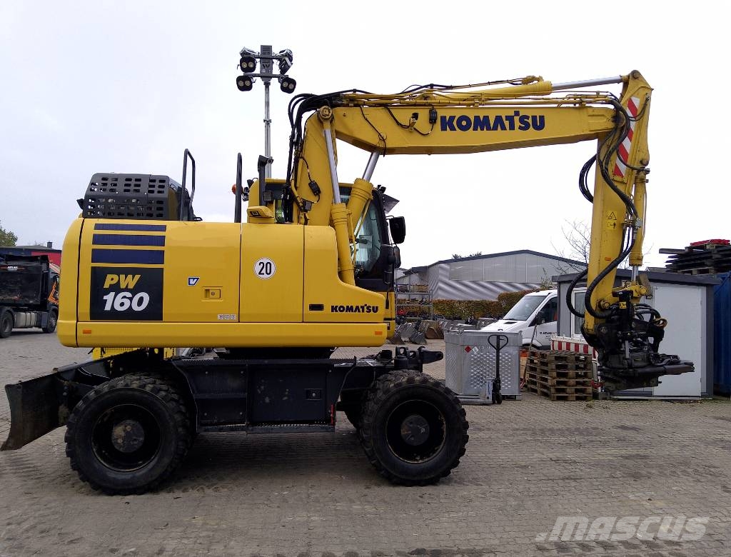 Komatsu PW160-11 حفارات بعجل
