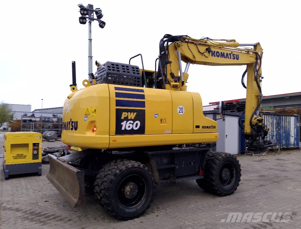 Komatsu PW160-11 حفارات بعجل