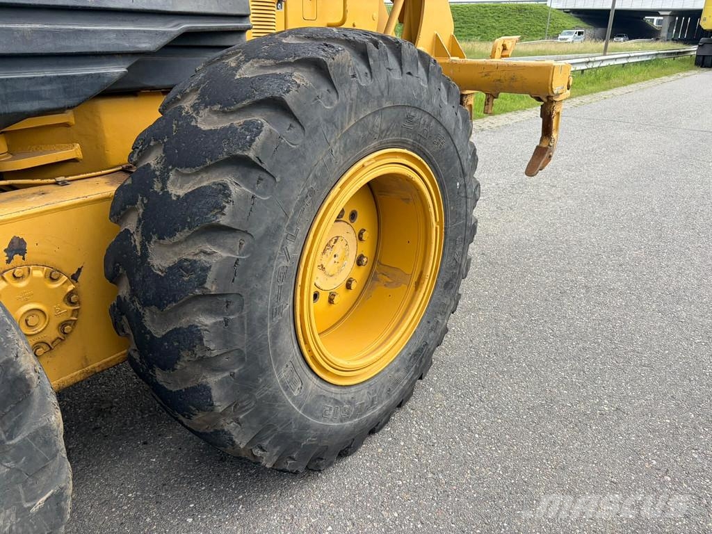 CAT 140H Грейдери