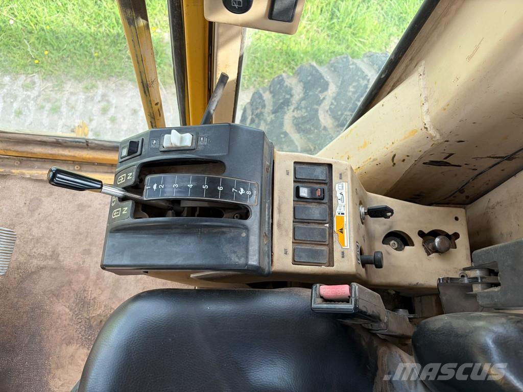 CAT 140H Грейдери