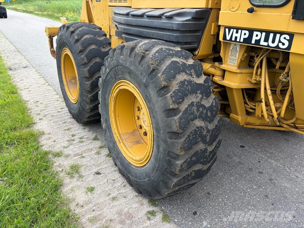 CAT 140H Грейдери