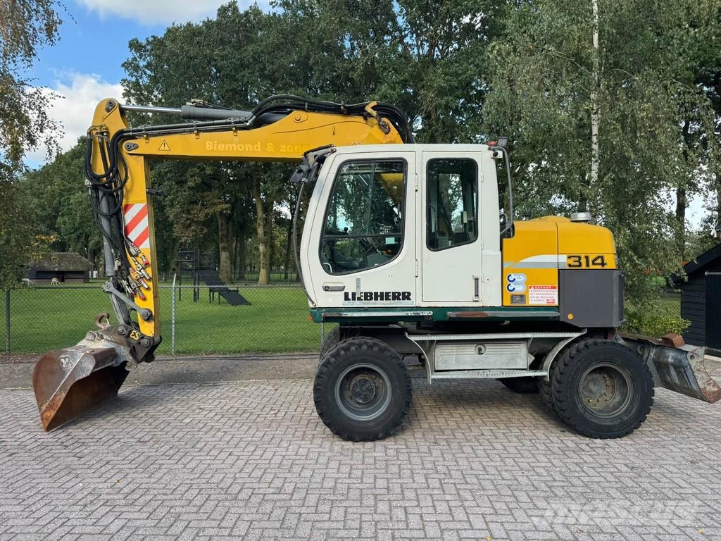 Liebherr A312 Mobiele kraan CW30 + kenteken Gumikerekes kotrók