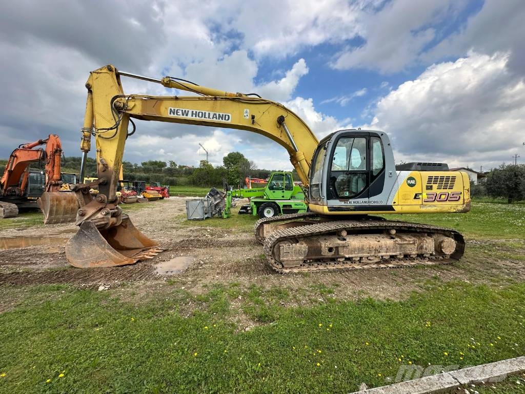 New Holland 305 Rupsgraafmachines