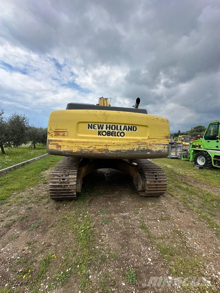 New Holland 305 Rupsgraafmachines