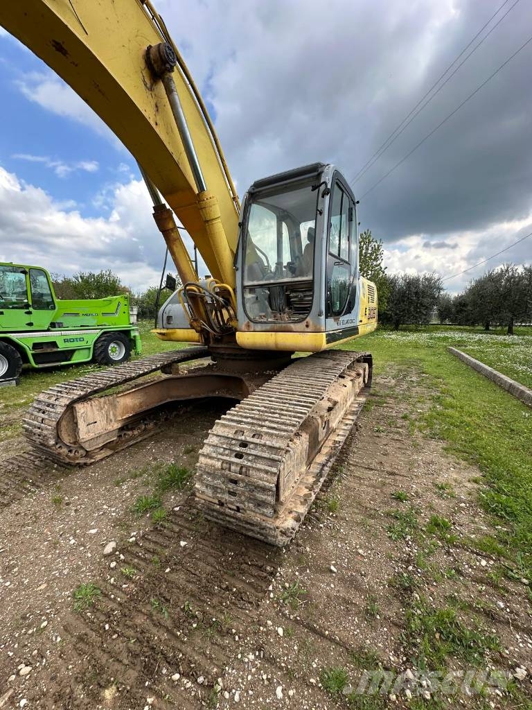 New Holland 305 Rupsgraafmachines