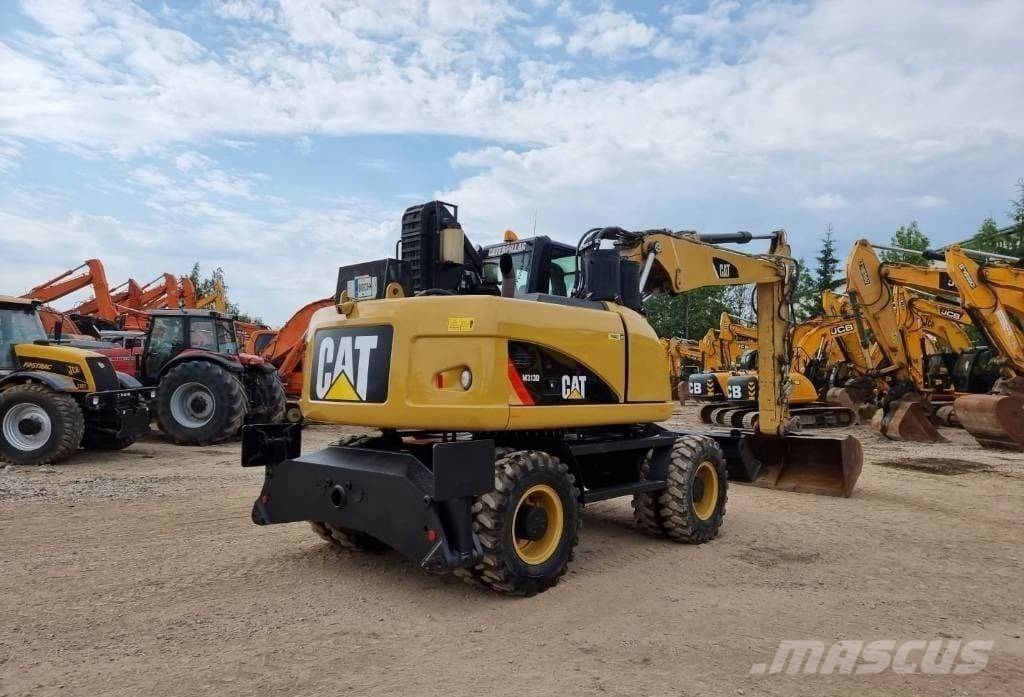 CAT M 313 D Wielgraafmachines