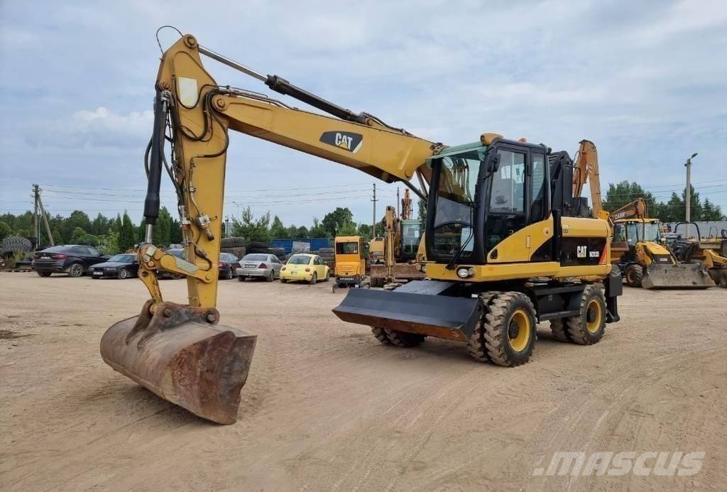 CAT M 313 D Wielgraafmachines