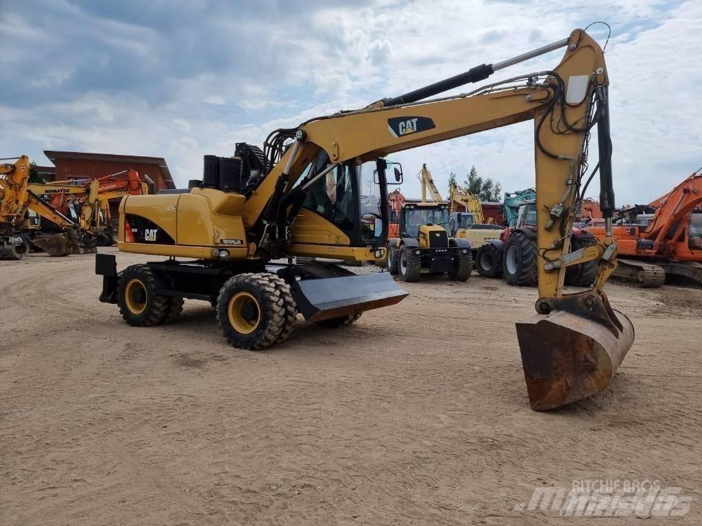 CAT M 313 D Wielgraafmachines