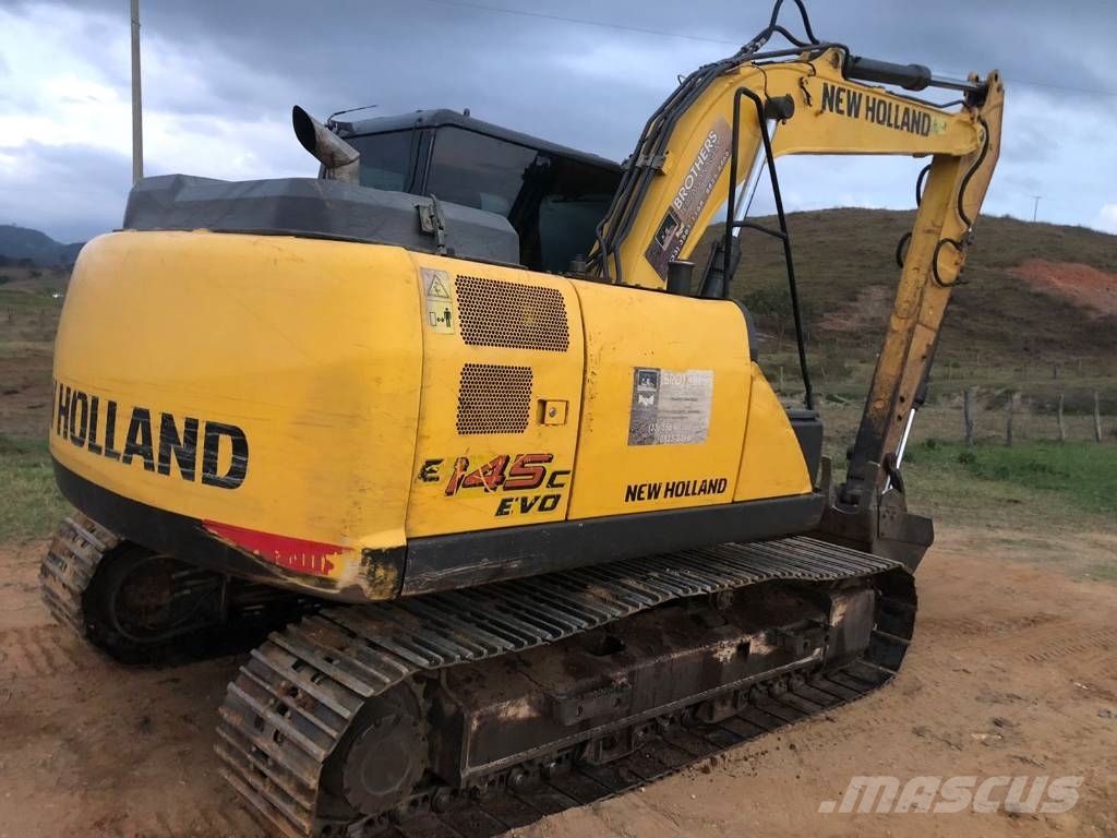 New Holland E 145 Bageri guseničari