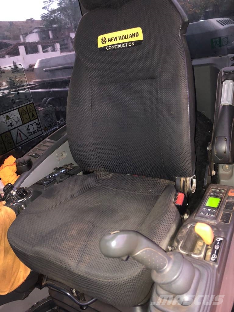 New Holland E 145 Bageri guseničari