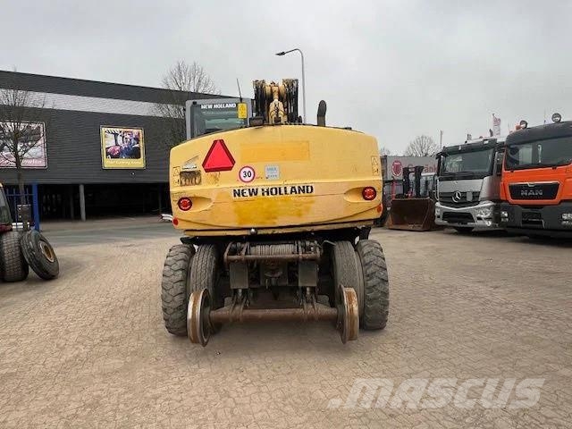 New Holland MH Plus 2wege Bagger Kiti kelių tiesimo įrengimai