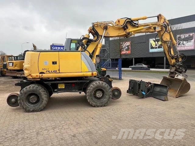 New Holland MH Plus 2wege Bagger Kiti kelių tiesimo įrengimai