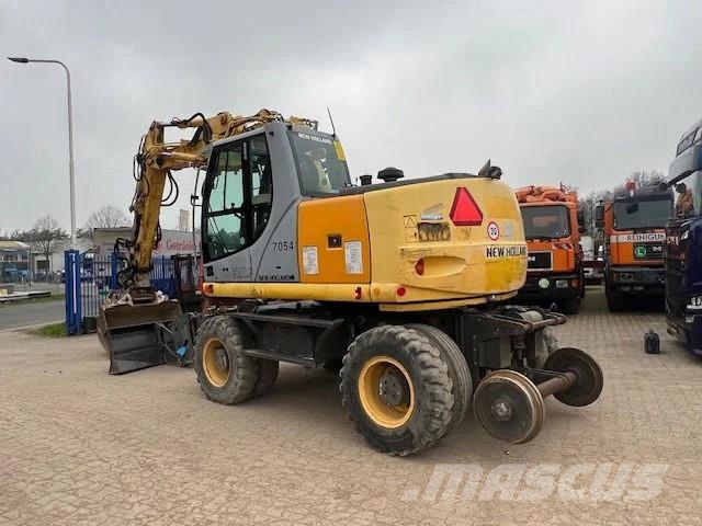New Holland MH Plus 2wege Bagger Kiti kelių tiesimo įrengimai