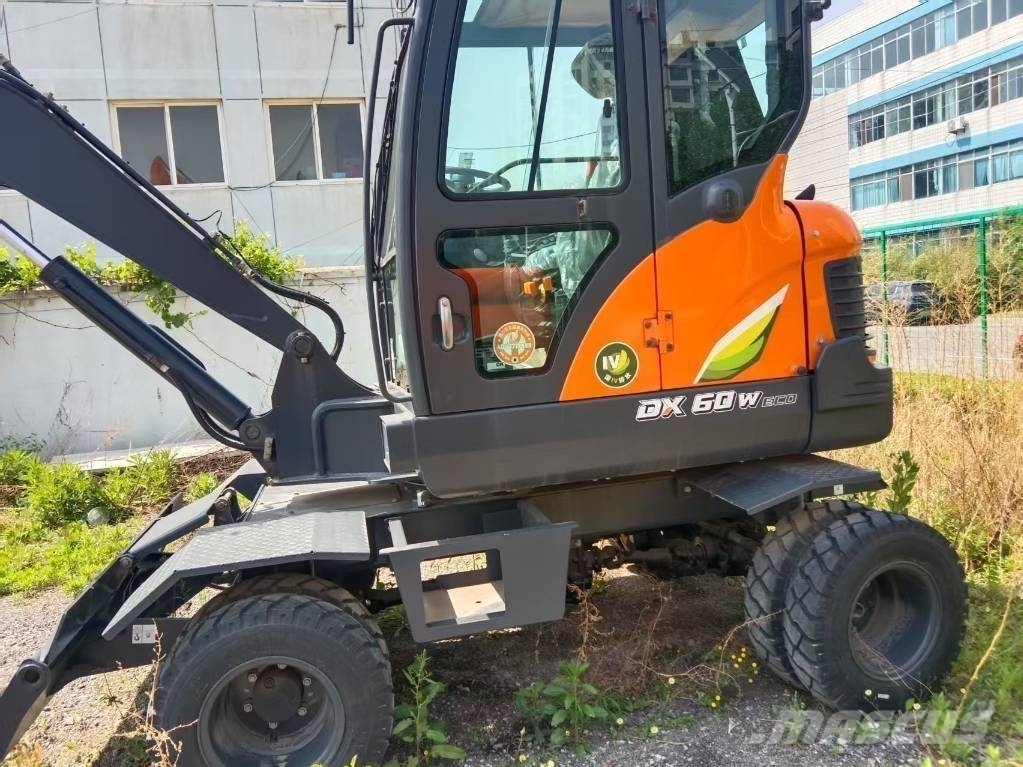 Develon DX60W ECO Bageri točkaši