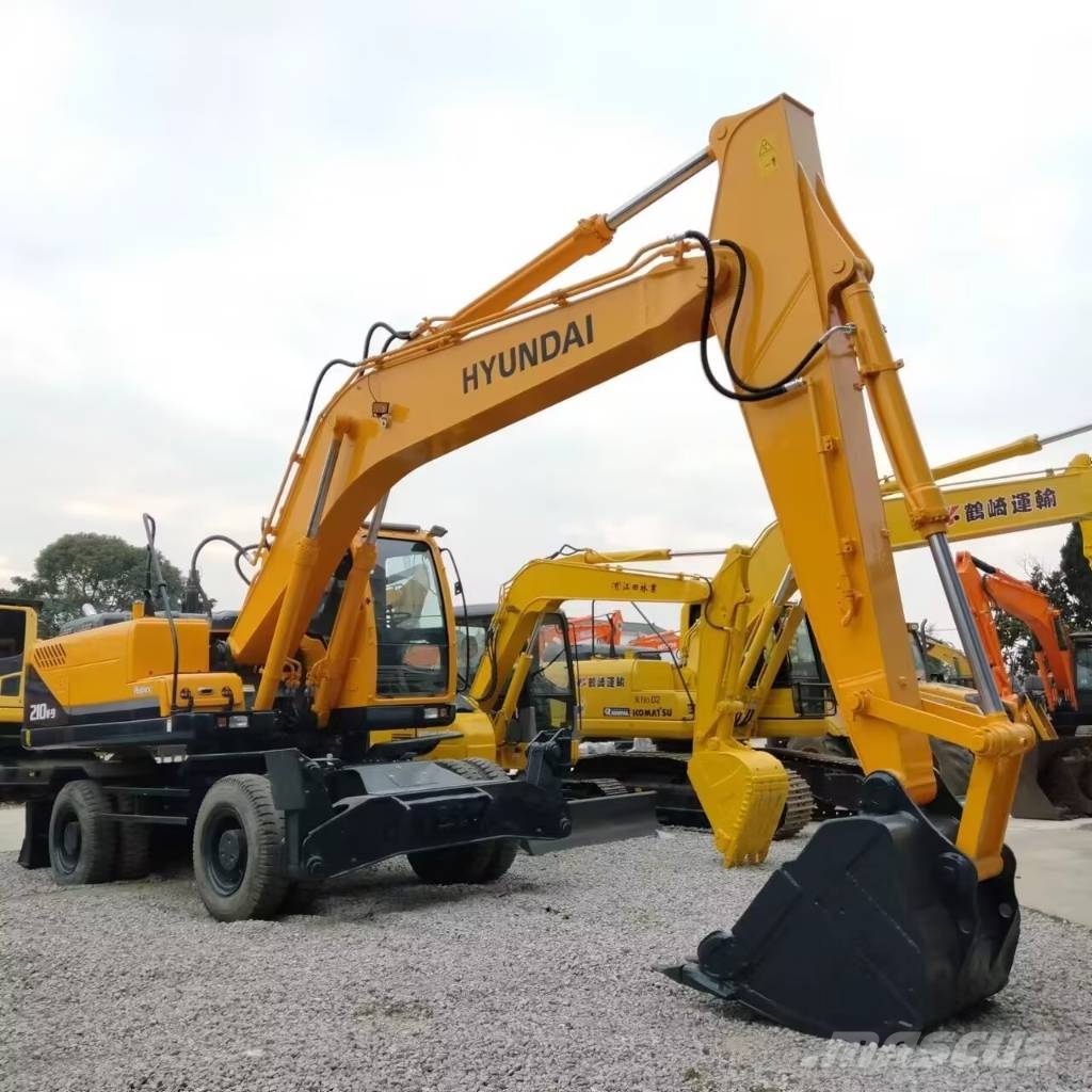 Hyundai 210W-9   Shanghai largest supplier حفارات بعجل