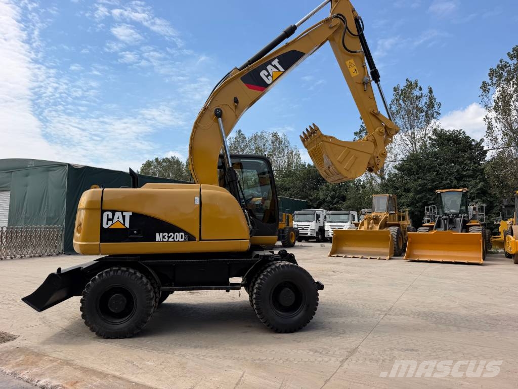 CAT M320D Mobilbagger