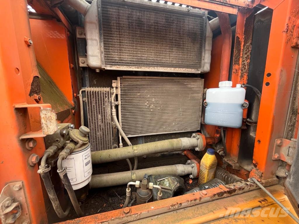 Doosan DX 225 LC Bagri goseničarji