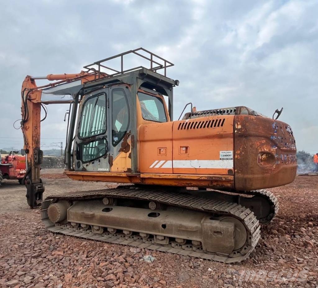Doosan DX 225 LC Bagri goseničarji