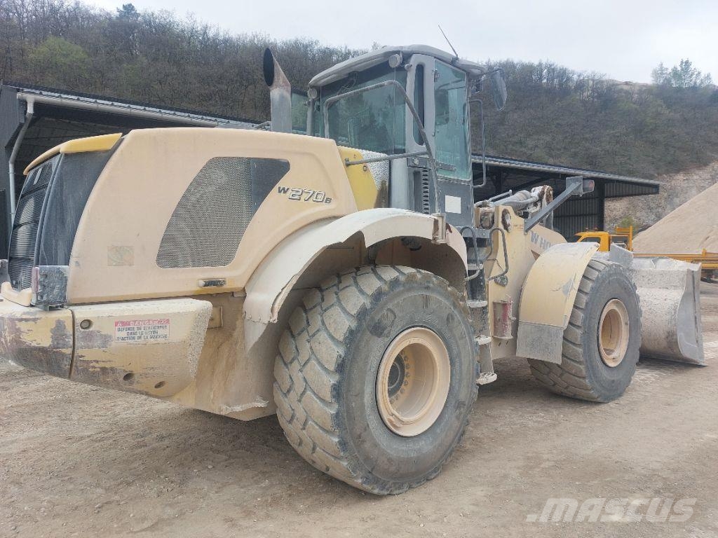 New Holland W 270 B Gumikerekes homlokrakodók