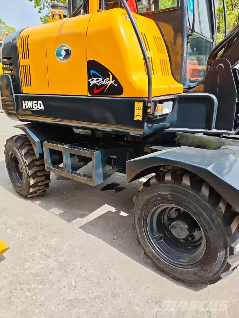 Hyundai 60 W VS Mobilbagger
