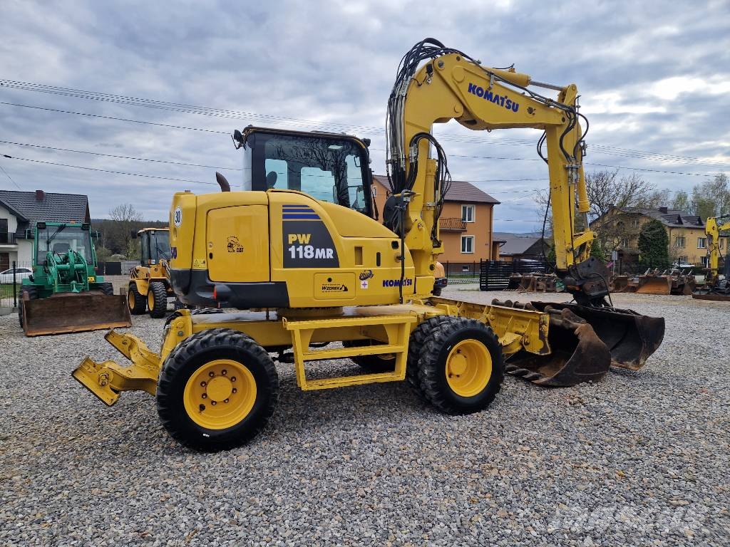 Komatsu PW 118 MR-8 حفارات بعجل