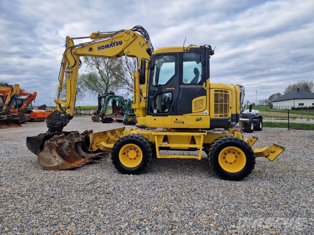 Komatsu PW 118 MR-8 حفارات بعجل